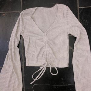 grey long sleeve cop top